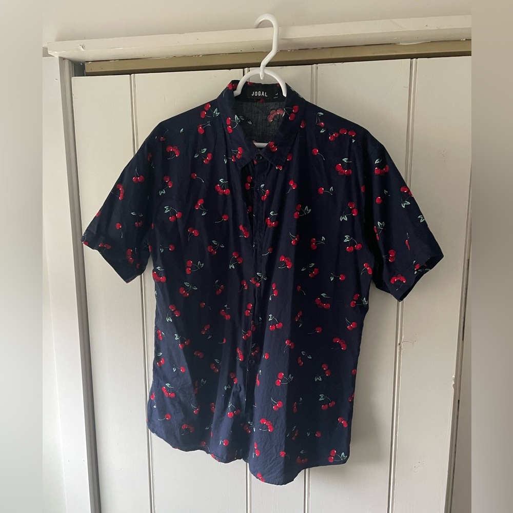 Short sleeve button down shirt with cherry pattern. Navy blue, size large